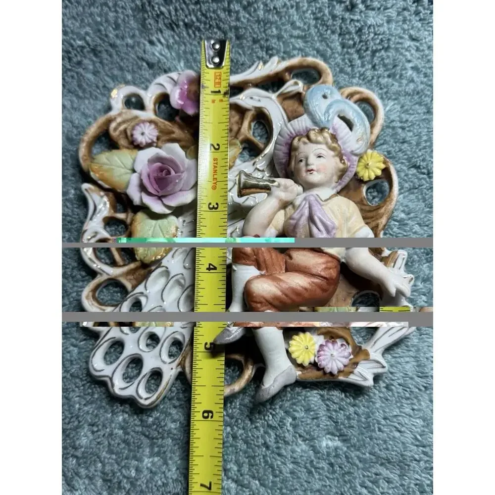 Vintage Porcelain Wall Plaque With Cherub And Floral Design